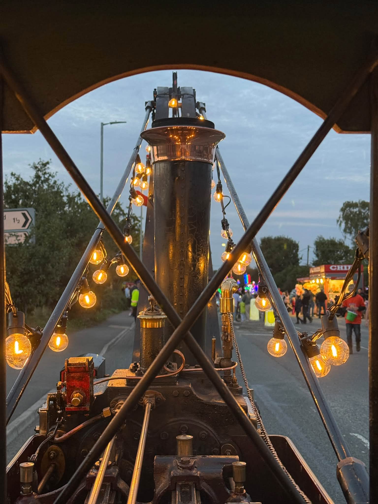 Festoon lights strung from the steam engine at dusk in Wellington